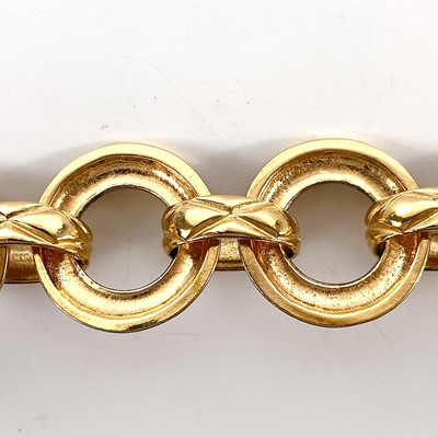 Lot 555 - A Chanel gold plated hoop long chain necklace.