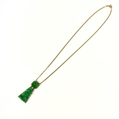 Lot 81 - A modern 9ct gold Chinese green jade pendant necklace.