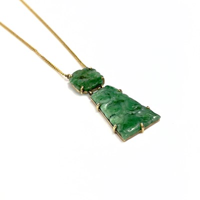 Lot 81 - A modern 9ct gold Chinese green jade pendant necklace.