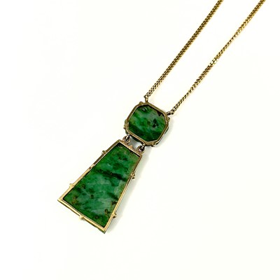 Lot 81 - A modern 9ct gold Chinese green jade pendant necklace.