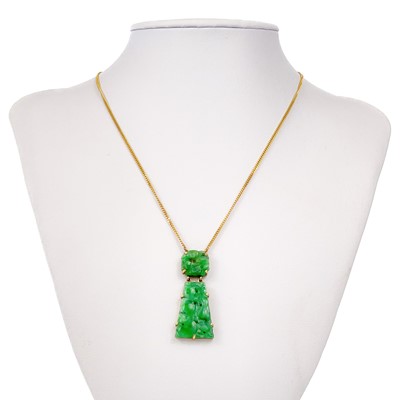 Lot 81 - A modern 9ct gold Chinese green jade pendant necklace.