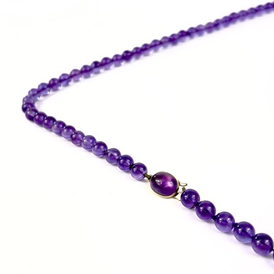 Lot 415 - A modern amethyst bead necklace with 9ct clasp.