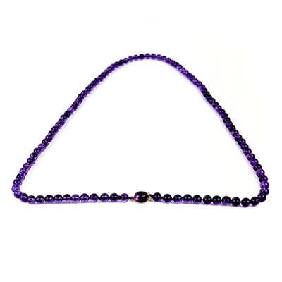 Lot 415 - A modern amethyst bead necklace with 9ct clasp.