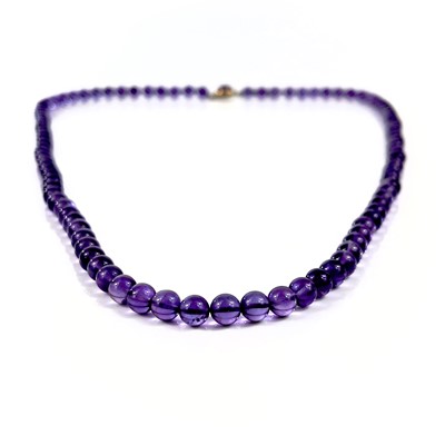 Lot 415 - A modern amethyst bead necklace with 9ct clasp.