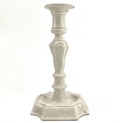 Lot 100 - A pearlware moulded candlestick, circa 1810.