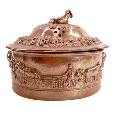 Lot 70 - A large 19th century pierced brown saltglaze tureen and cover.