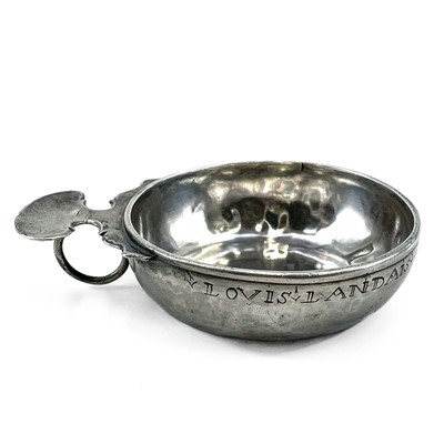 Lot 170 - An 18th century white metal wine taster.