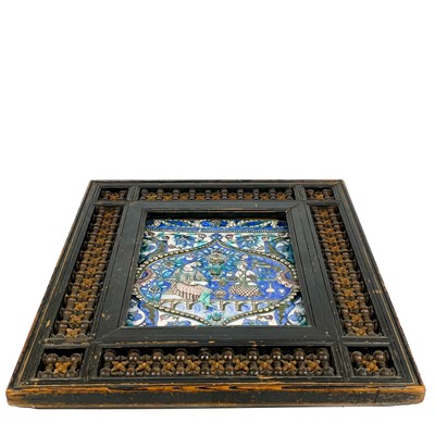 Lot 2 - A large Persian Qajar painted moulded pottery tile, 19th century.
