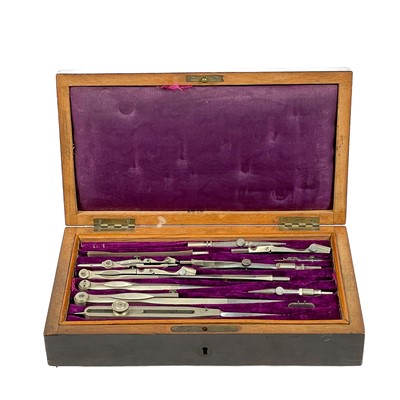 Lot 279 - A Victorian set of steel draftsman's instruments in a fitted rosewood box.