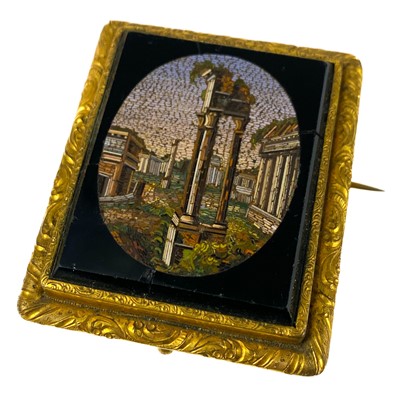 Lot 126 - A 19th century Grand Tour micro mosaic pinchbeck mounted brooch.