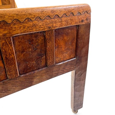 Lot 1818 - A Robert Mouseman Thompson of Kilburn oak panelled single bed frame.