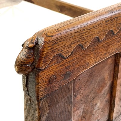 Lot 1818 - A Robert Mouseman Thompson of Kilburn oak panelled single bed frame.