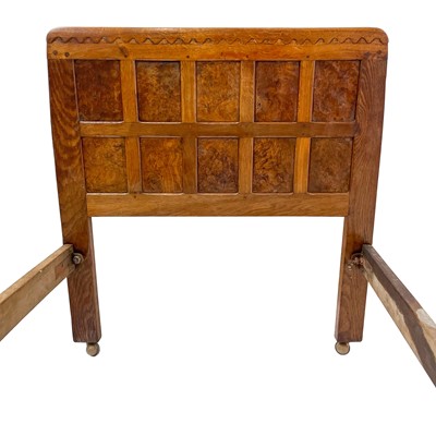 Lot 1818 - A Robert Mouseman Thompson of Kilburn oak panelled single bed frame.