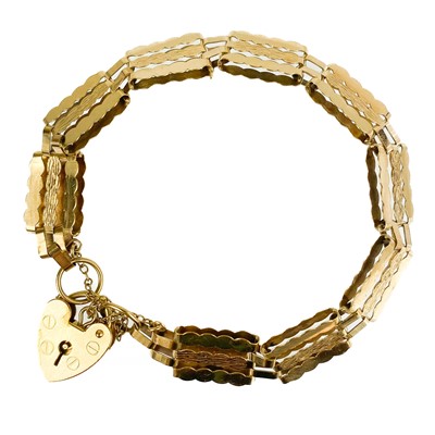 Lot 240 - A 9ct gold 1970's fancy gatelink bracelet.