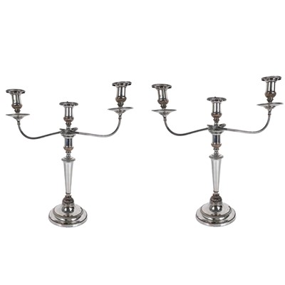 Lot 387 - A pair of 19th century silver plate on copper three branch candelabra.