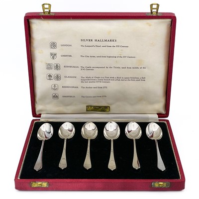 Lot 220 - A cased set of six silver 'Silver Hallmarks' teaspoons by Travis, Wilson & Co Ltd.