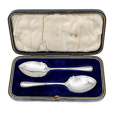 Lot 314 - A pair of Edwardian silver condiment spoons in fitted case.