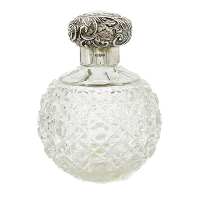 Lot 313 - A Victorian silver lidded cut glass ovoid scent bottle.