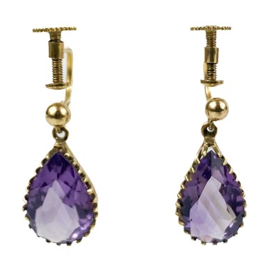 Lot 134 - A pair of 9ct gold amethyst set screw back pendant earrings.