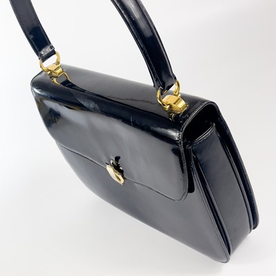 Lot 345 - A Gucci black patent leather evening handbag.