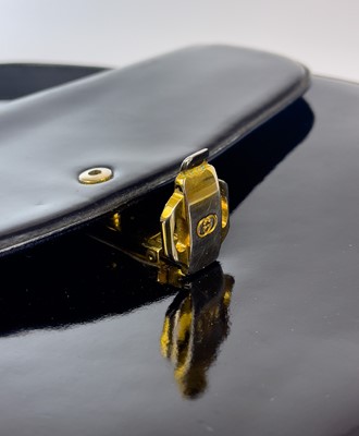 Lot 345 - A Gucci black patent leather evening handbag.