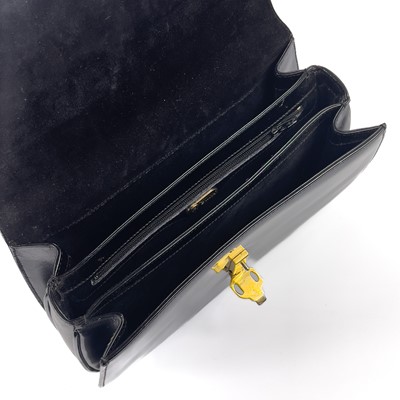 Lot 345 - A Gucci black patent leather evening handbag.