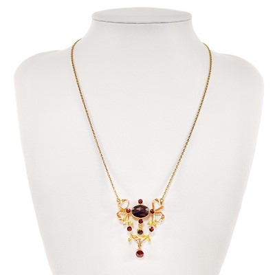 Lot 12 - A 14ct gold Edwardian style garnet and white stone set pendant necklace.