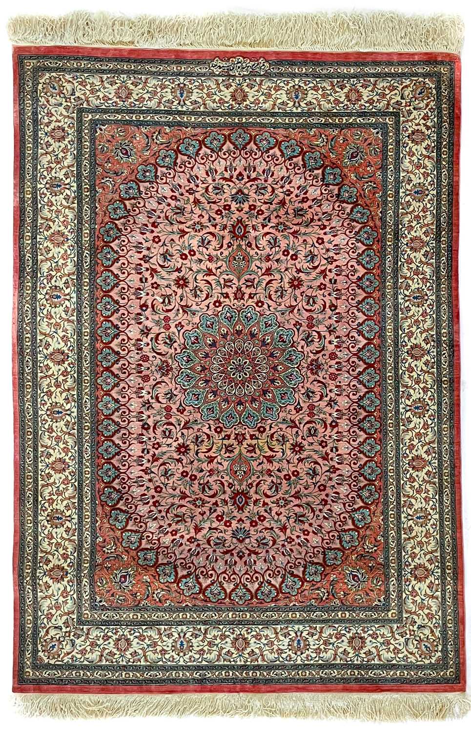 Lot 205 - A fine Persian silk rug, signed islamic