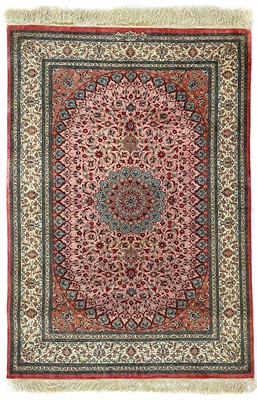 Lot 205 - A fine Persian silk rug, signed islamic cartouche