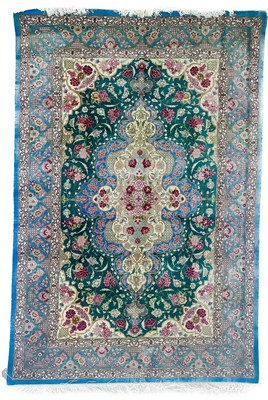 Lot 143 - A fine Persian silk rug.