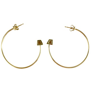 Lot 552 - Links Of London - a pair of 18ct gold Tigers eye set hoop earrings.