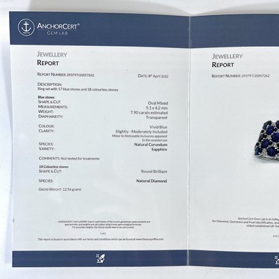 Lot 301 - A stunning 18ct white gold natural sapphire and diamond set dress ring, with Anchorcert report.