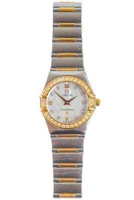 Lot 482 - An Omega Constellation steel and 18ct rose gold diamond set ladies automatic bracelet wristwatch.