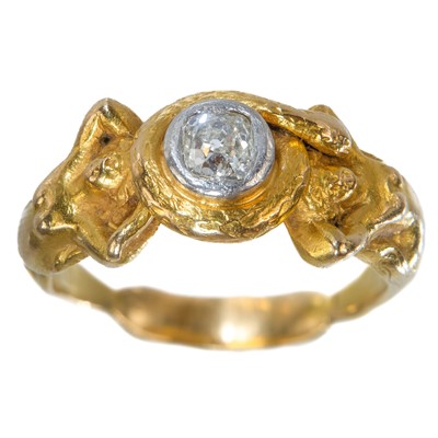 Lot 187 - A good 19th century 18ct gold and diamond set mermaid and serpent cast ring.