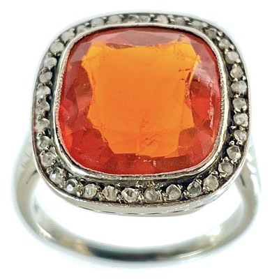 Lot 86 - A good early 20th century fire opal and diamond set ring.