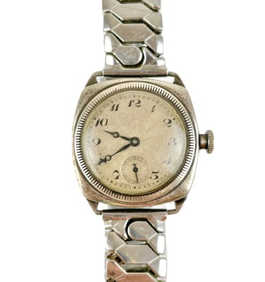 Lot 481 - A Cyma WWI silver hermetic cased wire-lug wristwatch, screw bezel enclosing the hinged movement.