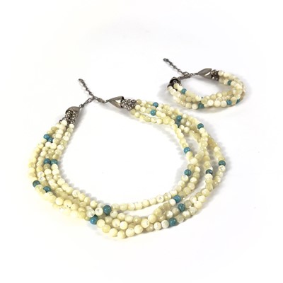 Lot 286 - A mother of pearl and turquoise bead multi-strand necklace and bracelet set.