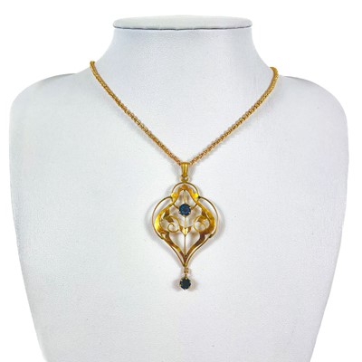 Lot 174 - A 9ct gold Art Nouveau blue stone set pendant necklace.