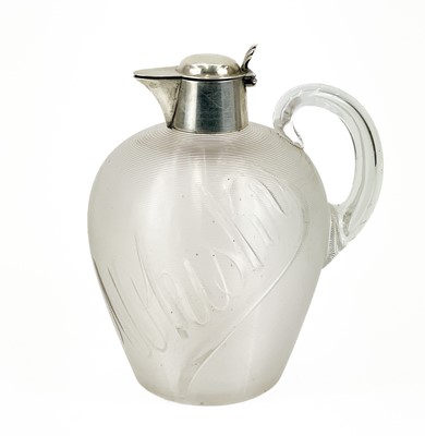 Lot 889 - A Victorian silver-spouted whiskey jug by Hukin & Heath Ltd.