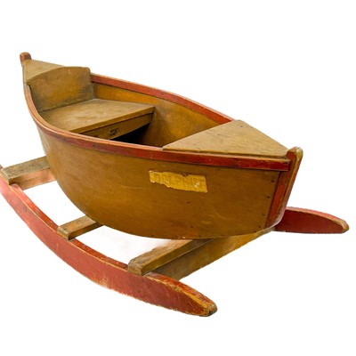 Lot 44 - A child's rocking boat.
