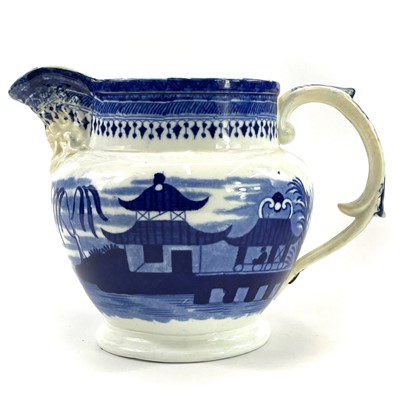 Lot 45 - A blue and white Chinoiserie printed porcellanous jug