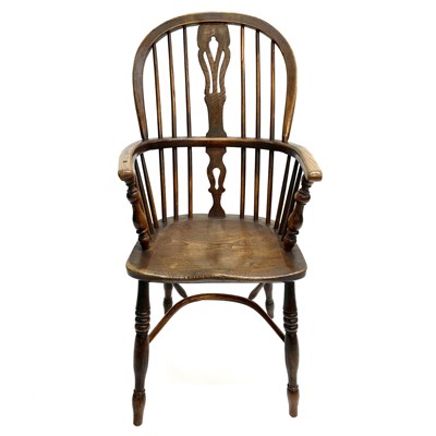 Lot 85 - An ash and elm Windsor elbow chair.