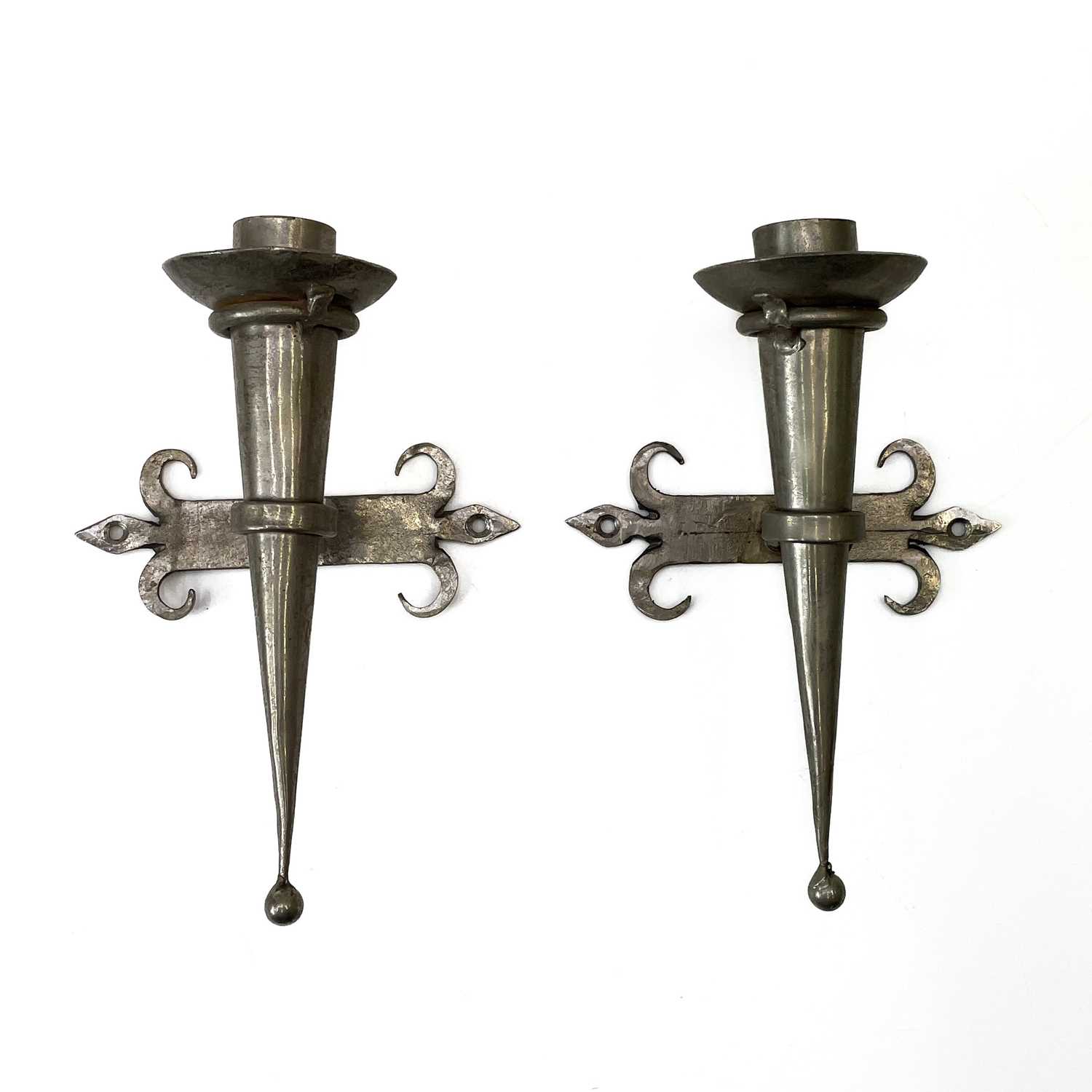 Lot 157 A pair of metal candle holder wall sconces.