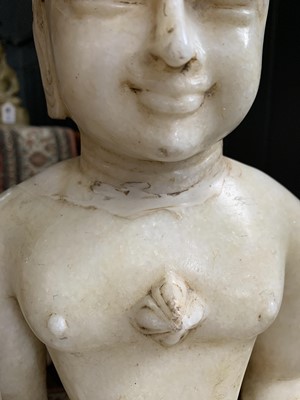 Lot 11 - An Indian Jain white marble seated buddha, 19th century.