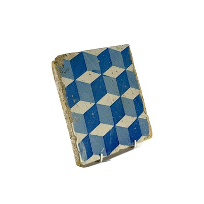 Lot 10 - A Spanish blue and white pottery tile, 19th century.