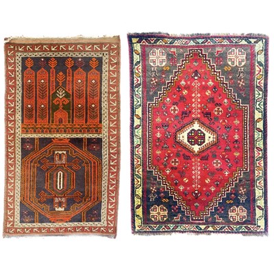 Lot 192 - A Belouch rug and a Shiraz rug, 20th century.