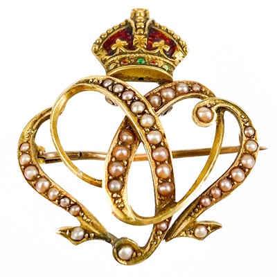 Lot 73 - An Edwardian high purity gold, enamel and seed pearl set '1902' coronation brooch.