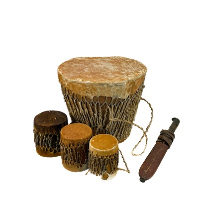 Lot 107 - A large African goat skin drum.