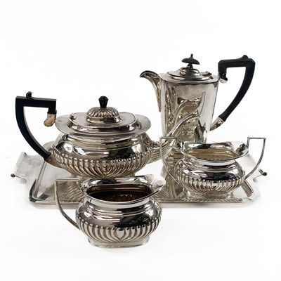 Lot 193 - A silver plated tea set with tray, and associated coffee pot.