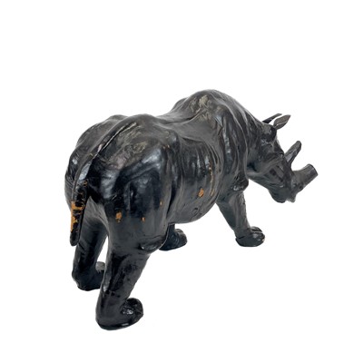 Lot 99 - A Liberty style leather clad model of a rhino.